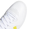 A white and yellow ADIDAS TYSHAWN FLAT WHITE / YELLOW / GOLD tennis shoe with a yellow stripe.