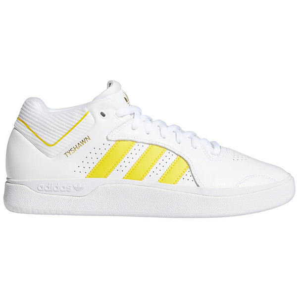 A white and yellow ADIDAS TYSHAWN FLAT WHITE / YELLOW / GOLD shoe.