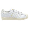 A white Adidas Superstar ADV White/Gold sneakers on a white background.