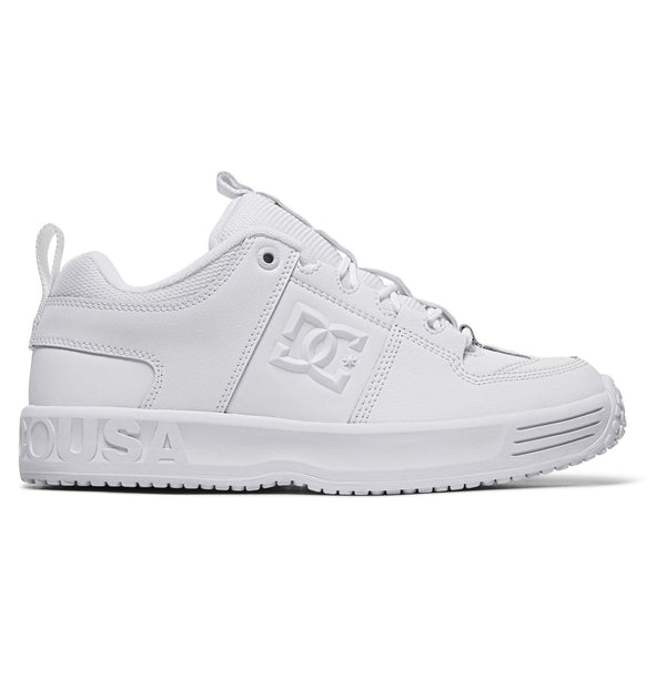 A black and white DC LYNX OG WHITE/WHITE skate shoe with the word DC on it.