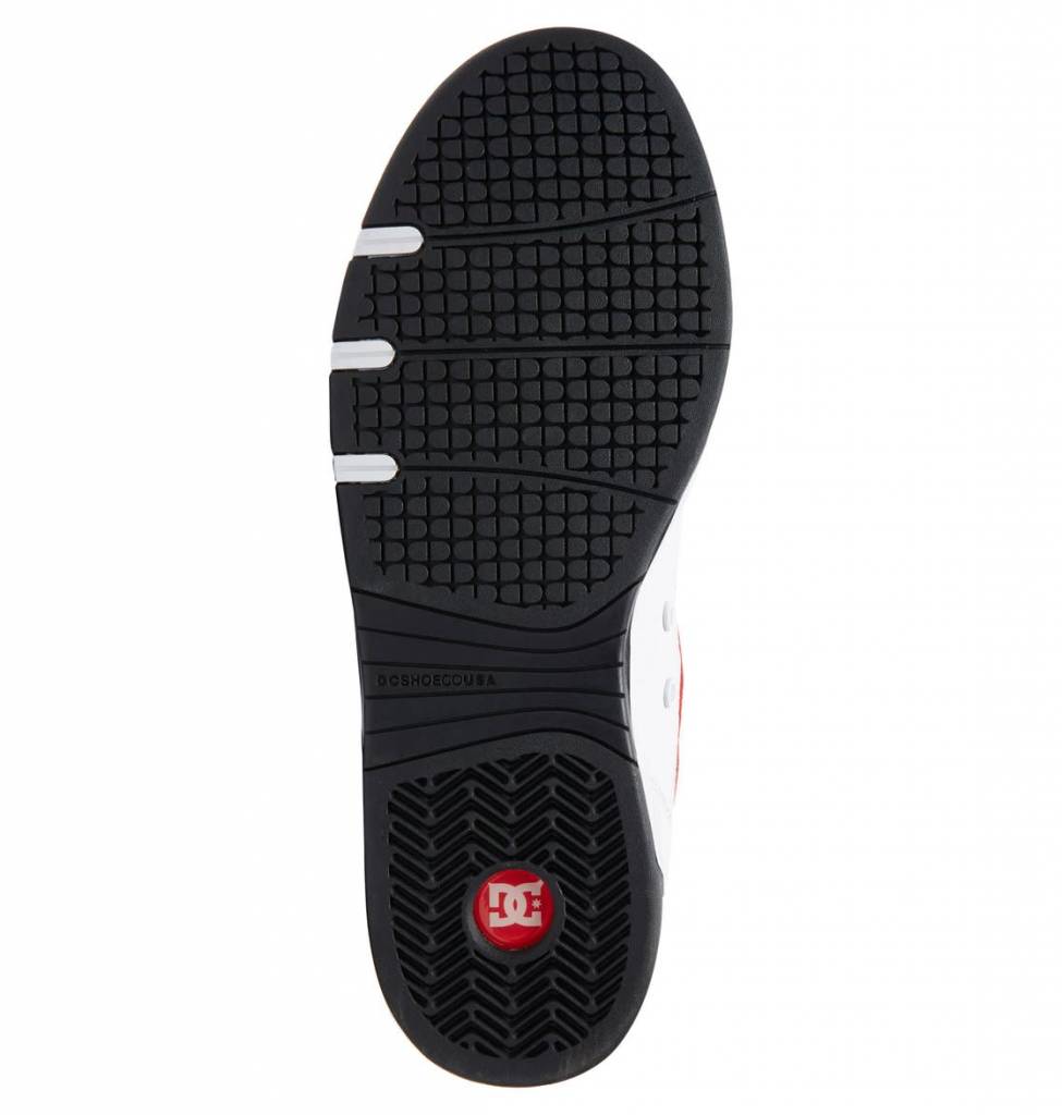 A pair of DC shoes legacy 98 slim black / white / red on a white background.