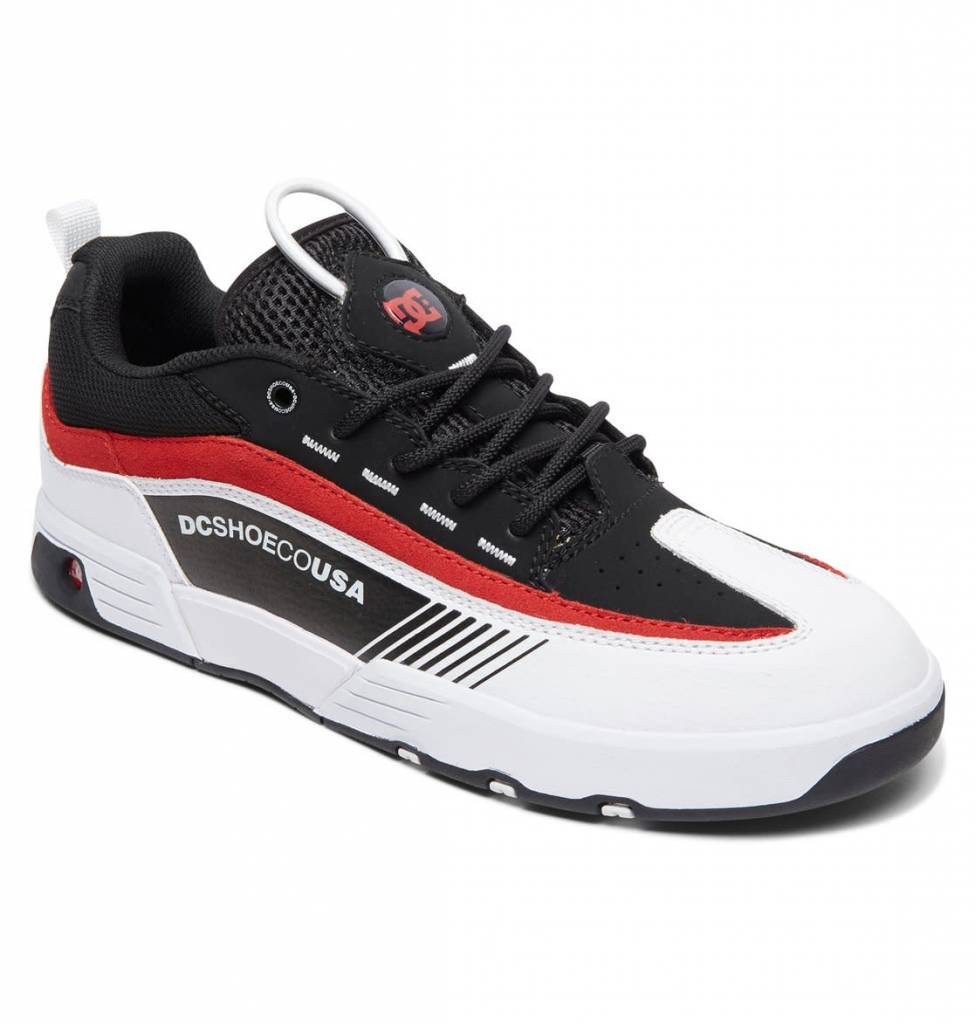 A durable skate shoe, the DC SHOES LEGACY 98 SLIM BLACK / WHITE / RED by DC, with a black and red leather upper, featuring white and red accents for added comfort.