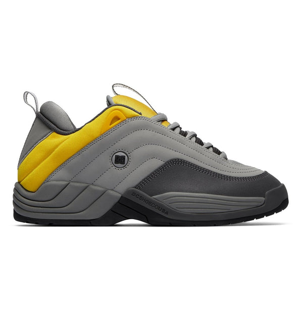 A pair of DC WILLIAMS OG GREY / YELLOW skate shoes on a white background.