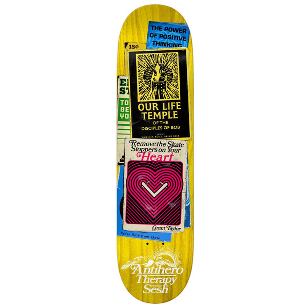 A yellow skateboard deck covered in ANTI HERO TAYLOR THERAPY SESH stickers and various stains (brand: ANTIHERO).