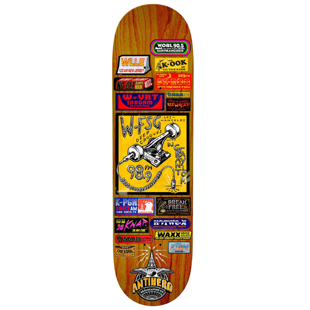 A skateboard deck adorned with a plethora of ANTIHERO and TAYLOR BROADCASTING stickers.