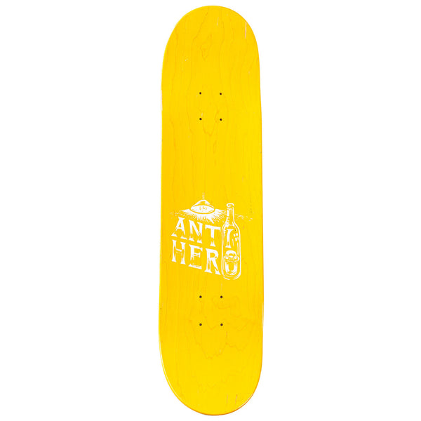 A yellow skateboard with a white ANTI HERO CARDIEL AGUARDIENTE 8.38 logo on it. The brand name is ANTIHERO.