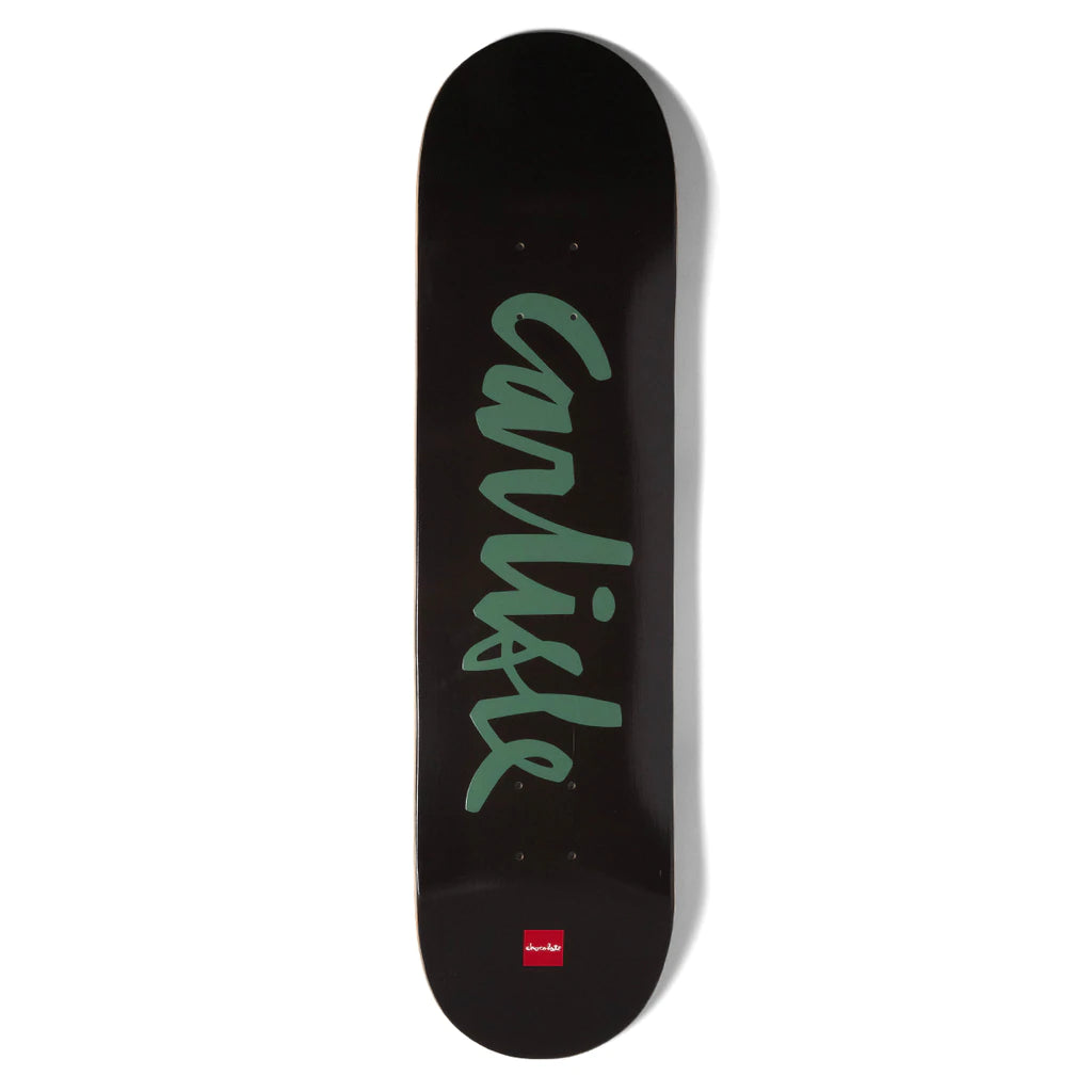 A black CHOCOLATE skateboard with green writing on it.