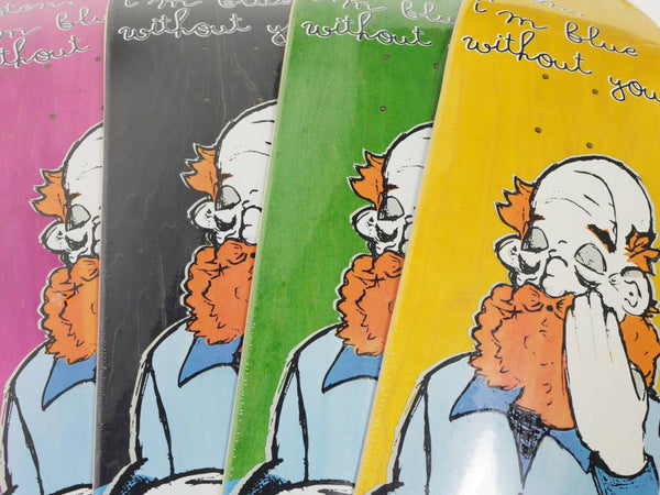 A set of BLUETILE LOVE ALWAYS skateboards with whimsical cartoon characters on their board graphics, produced by Bluetile Skateboards.