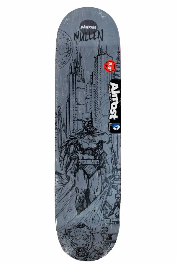 The ALMOST MULLEN BATMAN SKETCH 8.0 skateboard deck features a black and white Batman graphic with city buildings in the background and ALMOST branding.