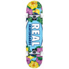 A skateboard with a REAL BLOSSOMS COMPLETE 8.0 design on it.