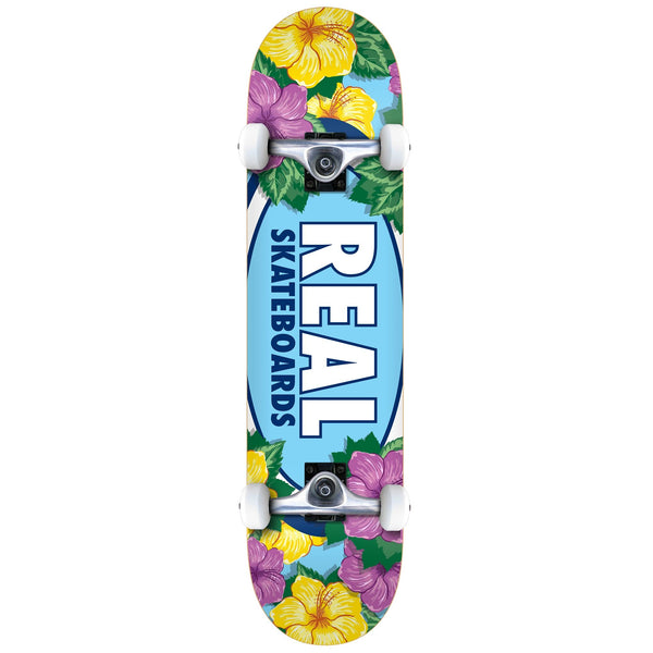 A skateboard with a REAL BLOSSOMS COMPLETE 8.0 design on it.