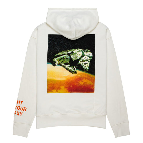 An off-white hooded sweatshirt called the ELEMENT X STARWARS FIGHT HOODIE, by the brand ELEMENT, features an image of a spaceship over a planet on the back. The right sleeve displays orange text that reads, "FIGHT FOR YOUR GALAXY".