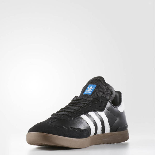 A black and white ADIDAS SAMBA ADV BLACK / WHITE / GUM shoe with white soles.