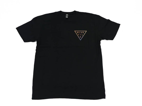 A BLUETILE TRI-DYE t-shirt from Bluetile Skateboards with a triangle on it.