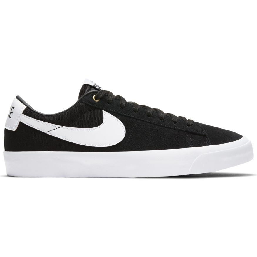 A Nike black and white shoe with a white sole.