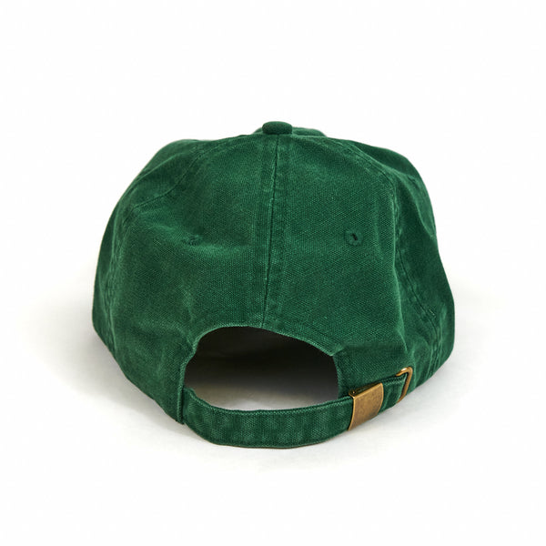 A green BLUETILE PUFF HEART Dad hat with a gold buckle by Bluetile Skateboards.