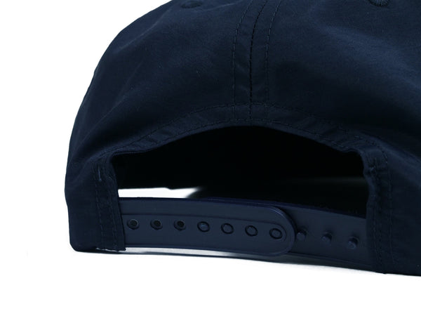 A surplus BLUETILE SUPPLY CO NYLON SURF HAT NAVY made from nylon.