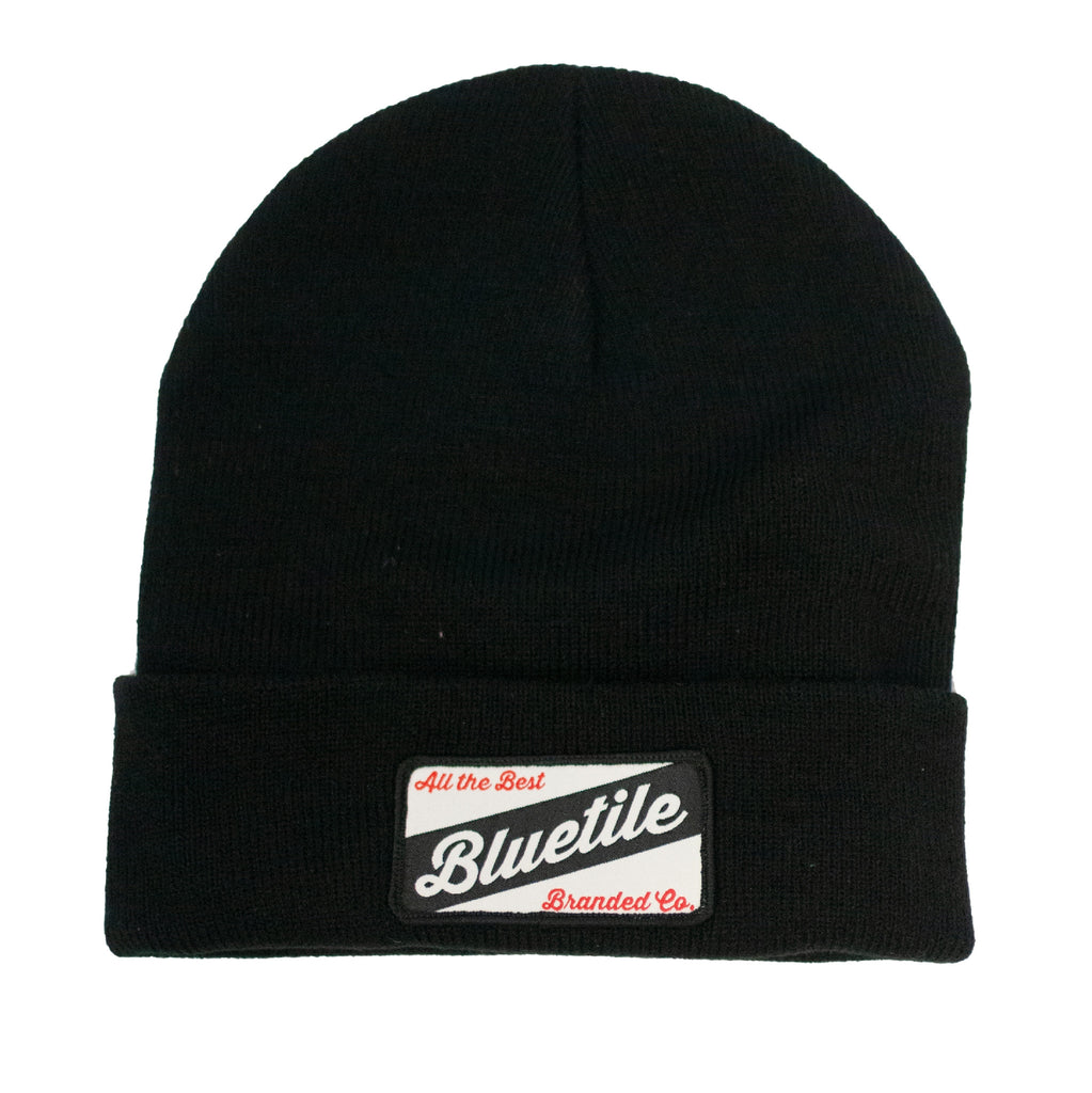 A BLUETILE CRAFT PATCH BEANIE BLACK with the word Bluetile Skateboards on it.
