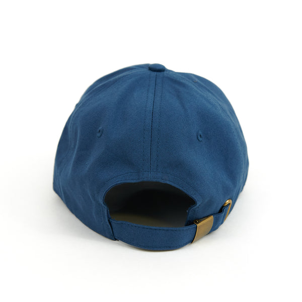 The back view of a Bluetile Skateboards BLUETILE LOVE SIX PANEL HAT HARBOUR BLUE baseball cap.