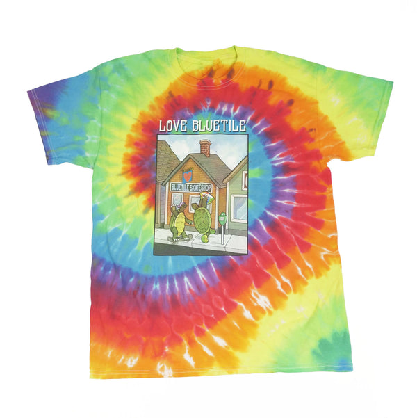 A Bluetile Skateboards tie-dye t-shirt with an image of a house.