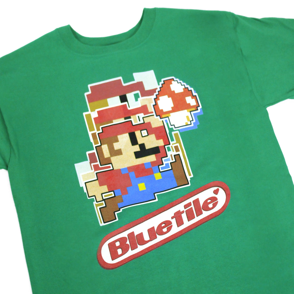 A BLUETILE GROW UP T-shirt with an image of Mario and mushrooms. (Brand: Bluetile Skateboards)