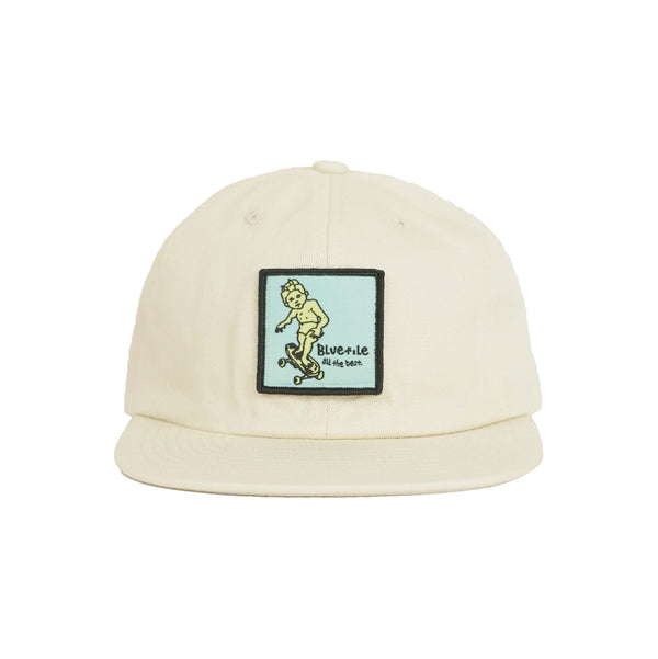 A BLUETILE SKETCHY PATCH HAT EGGSHELL with an image of a skateboarder on it, made by Bluetile Skateboards.