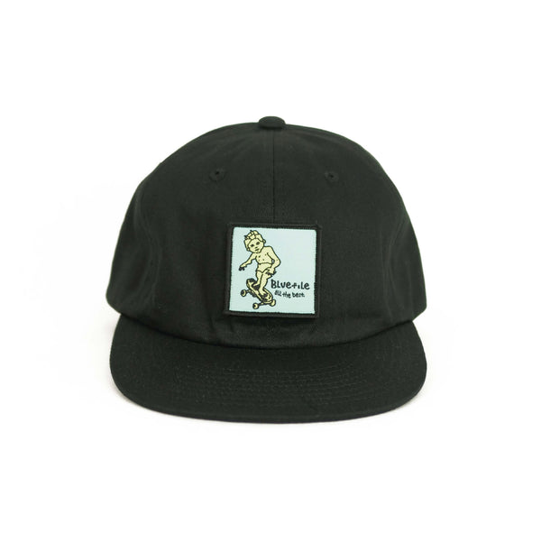 A BLUETILE SKETCHY PATCH HAT BLACK hat with a sketchy skateboarder image on it.