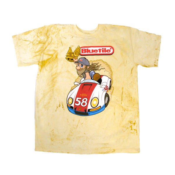 A yellow BLUETILE STREET RACER t-shirt with a cartoon character riding a car from Bluetile Skateboards.