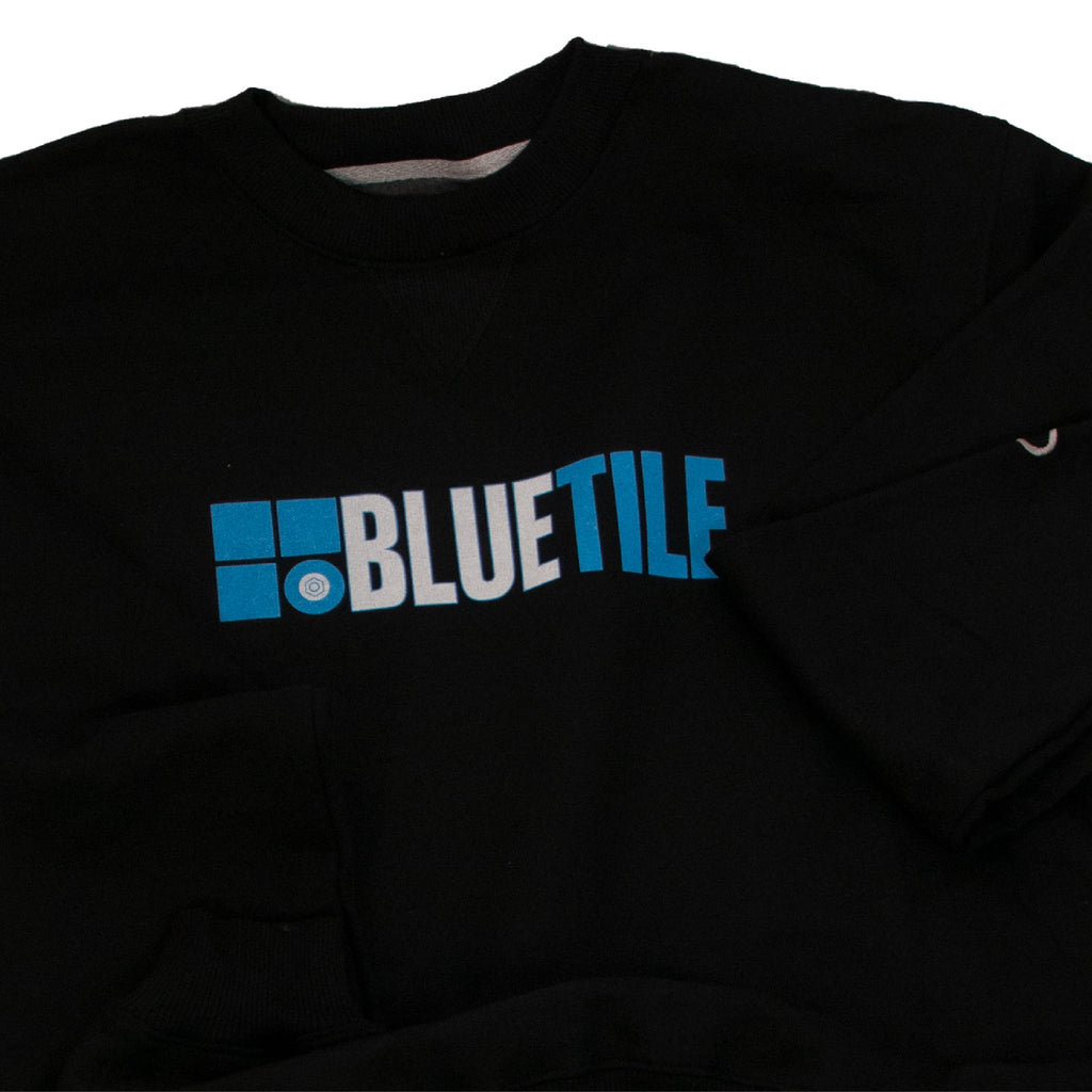 A BLUETILE THROWBACK 2010 LOGO CREWNECK BLACK sweatshirt from Bluetile Skateboards, serving as a throwback to 2010.