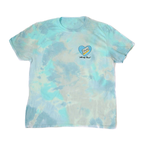A Bluetile Skateboards tie dye t-shirt with a heart on it.