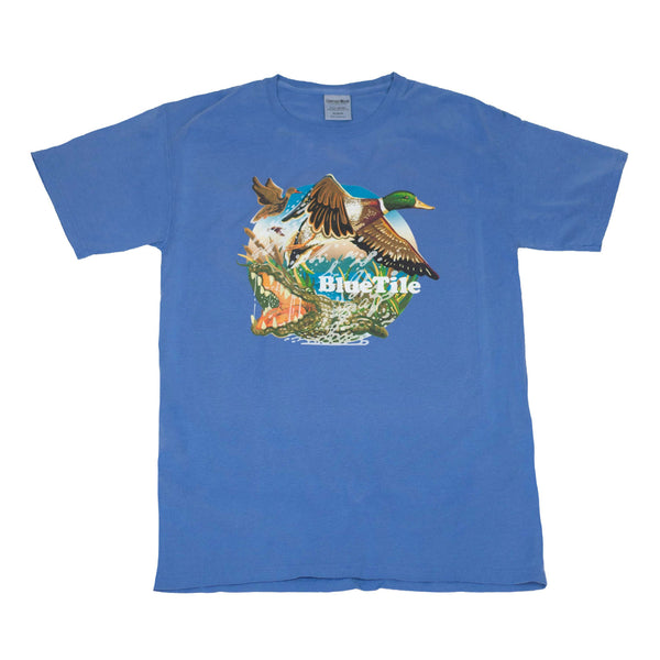 A BLUETILE WILDERNESS DUCKS T-SHIRT FORTE BLUE with an image of a bald eagle and a duck. (Brand: Bluetile Skateboards)