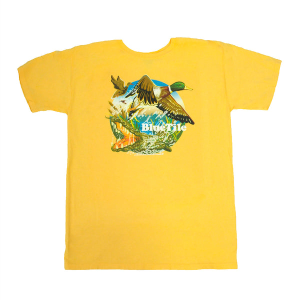 A BLUETILE WILDERNESS DUCKS T-SHIRT SUNNY YELLOW by Bluetile Skateboards with an alligator and a bird on it.