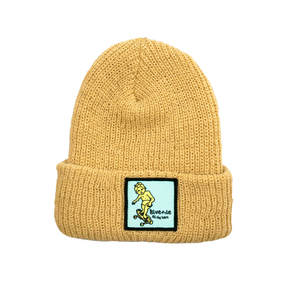 A yellow BLUETILE X GONZ SKETCHY PATCH BEANIE with an image of a skateboarder on it, featuring the GONZ SKETCHY PATCH by Bluetile Skateboards.