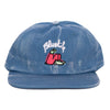 A BLUETILE X LUCAS BEAUFORT HAT FADED BLUE with an image of a dog on it from Bluetile Skateboards.