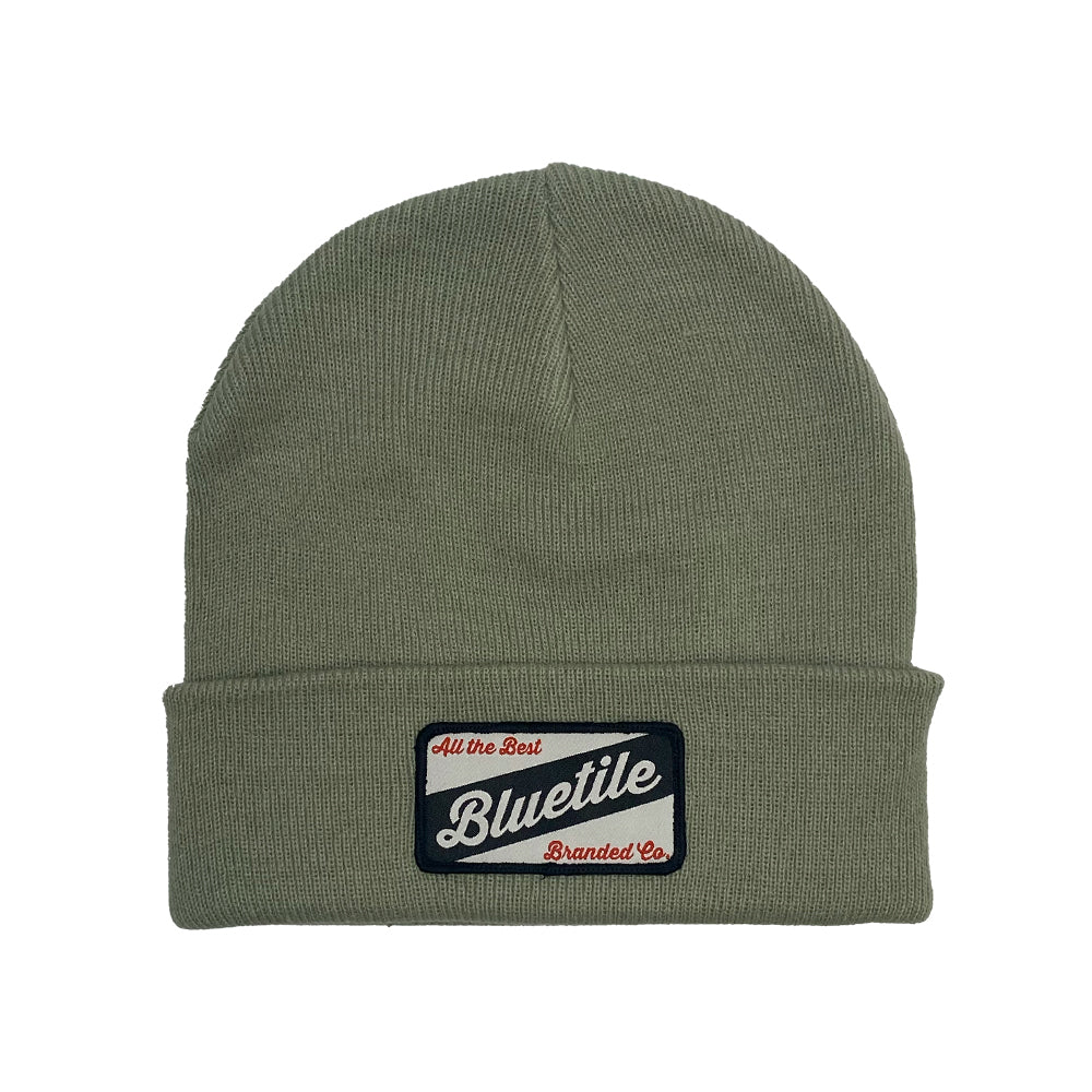 A BLUETILE CRAFT PATCH BEANIE PISTACHIO with the word 'buzzle' on it from Bluetile Skateboards.