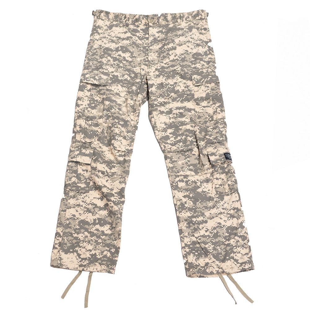 A pair of durable and comfortable BLUETILE FORAGER CARGO PANT DIGI CAMO pants on a white background from Bluetile Skateboards.