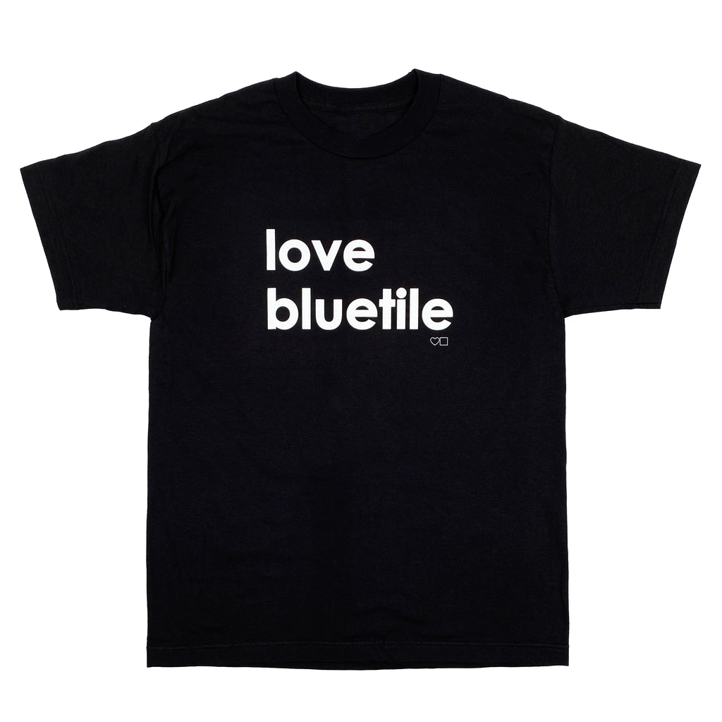 A black Bluetile Skateboards t-shirt with the word love BLUETILE on it.