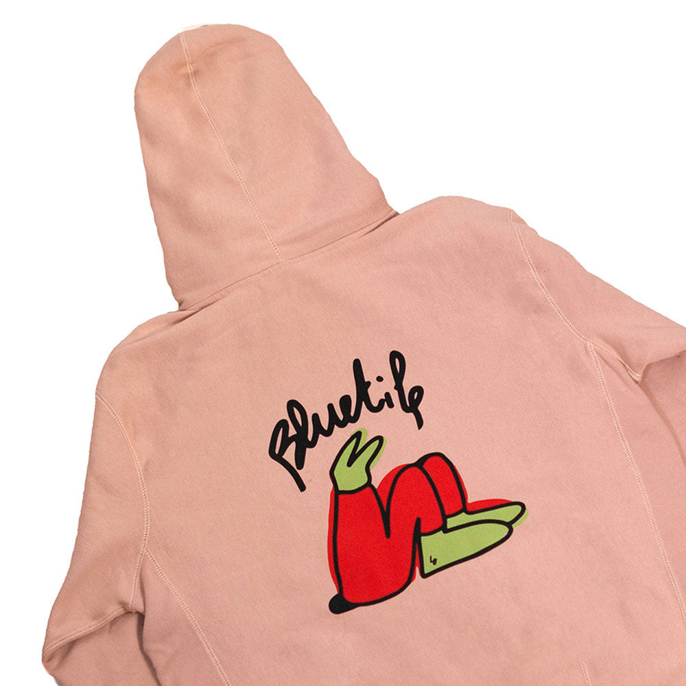 A Bluetile Skateboards BLUETILE X L.B. STILL GROWING HOODIE DUSTY PINK with red and green artwork.