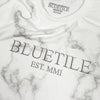 A Bluetile Skateboards BLUETILE CHISELED TEE MARBLE with the word bluetile on it.