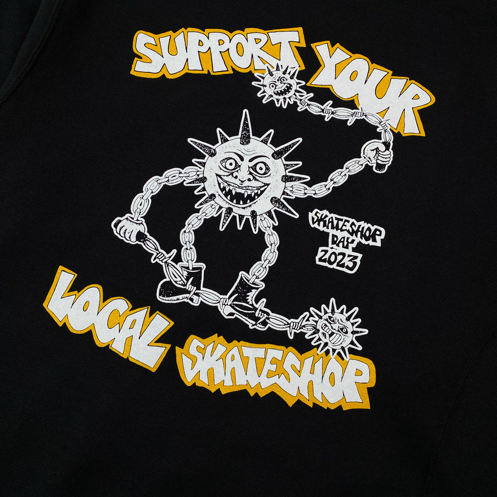 Support your local skateboarder BLUETILE X SKATESHOPDAY TEE BLACK hoodie. Featuring original artwork from Skate Shop Day, this hoodie is a must-have for any skate enthusiast.