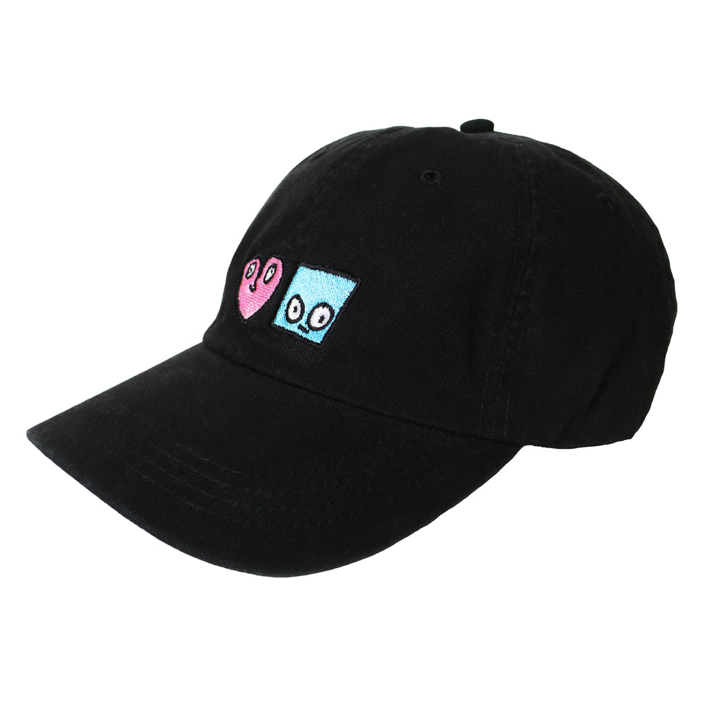 A black BLUETILE X SPINA HEART & SQUARE HAT BLACK with a pink and blue heart on it, featuring the SPINA HEART & SQUARE HAT BLACK design, brought to you by Bluetile Skateboards.