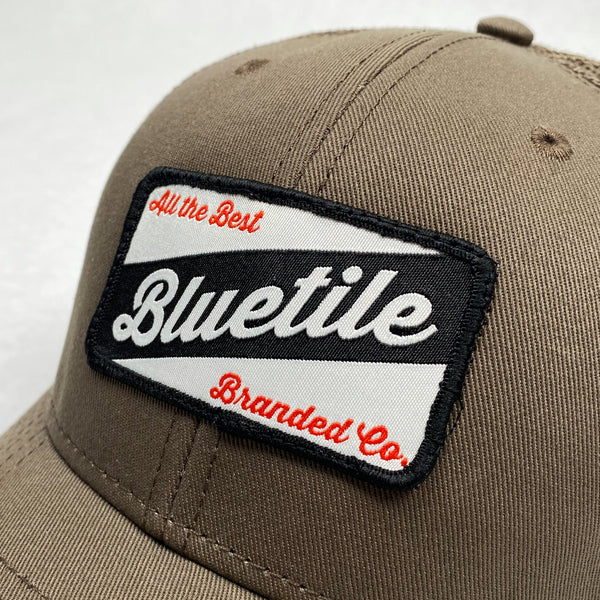 A BLUETILE CRAFT PATCH TRUCKER WALNUT snapback cap from Bluetile Skateboards.