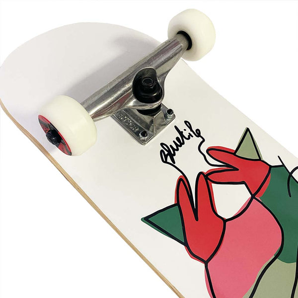 A skateboard with an image of a cat on it featuring Bluetile X trucks, the BLUETILE X L.B. ANNIVERSARY PARTY COMPLETE by Bluetile Skateboards.