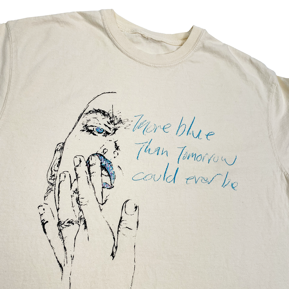 A BLUETILE BLUE TOMORROW SHIRT PARCHMENT with a drawing of a man holding his hand, featuring bluetile artwork.