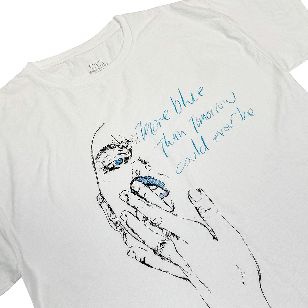 A Bluetile Skateboards Blue Tomorrow Shirt White with a drawing of a woman's mouth.