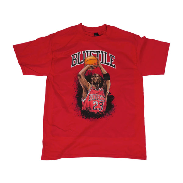A BLUETILE JUMP SHOT T-SHIRT RED featuring an image of a Chicago Bulls player in the midst of a jump shot from Bluetile Skateboards.