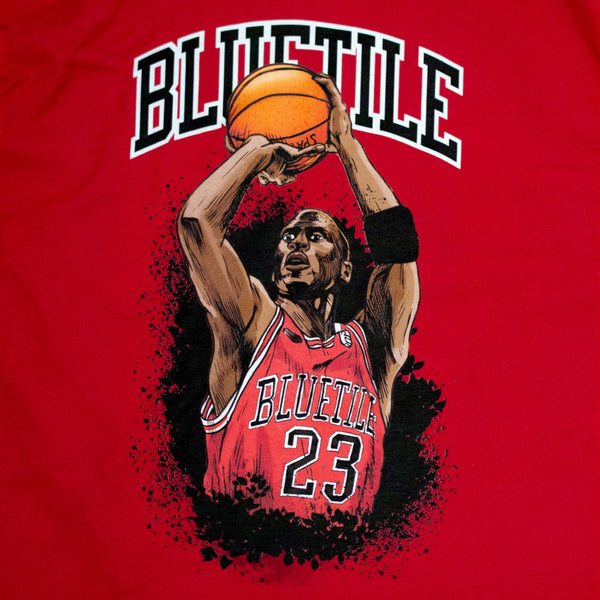 A BLUETILE JUMP SHOT T-SHIRT RED with a basketball player making a jump shot.