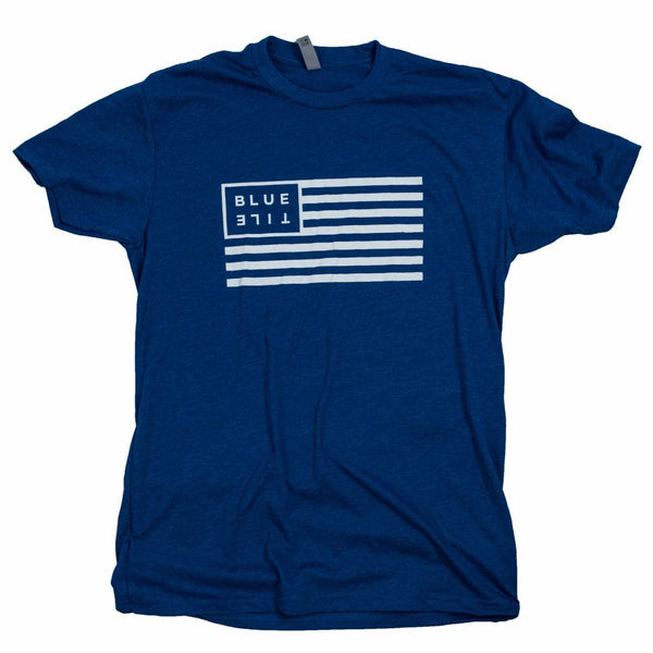 A United States of Bluetile - Blue/White T-Shirt with an American flag on it, from Bluetile Skateboards.