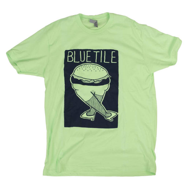 A Bluetile Skateboards BLUETILE X BLACKMON FUR BURGER T-SHIRT FIREFLY GREEN with a blue burger on it.