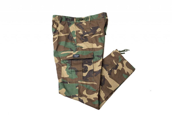 A pair of BLUETILE SURPLUS CARGO PANT CLASSIC CAMO by Bluetile Skateboards on a white background.